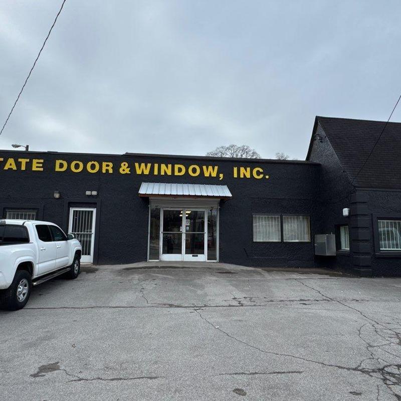 Commercial storefront doors and windows on black building