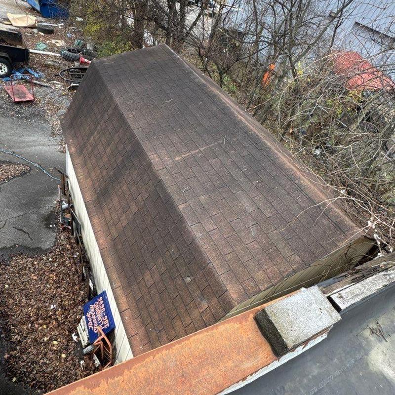 Asphalt shingle roof with possible hail damage inspection