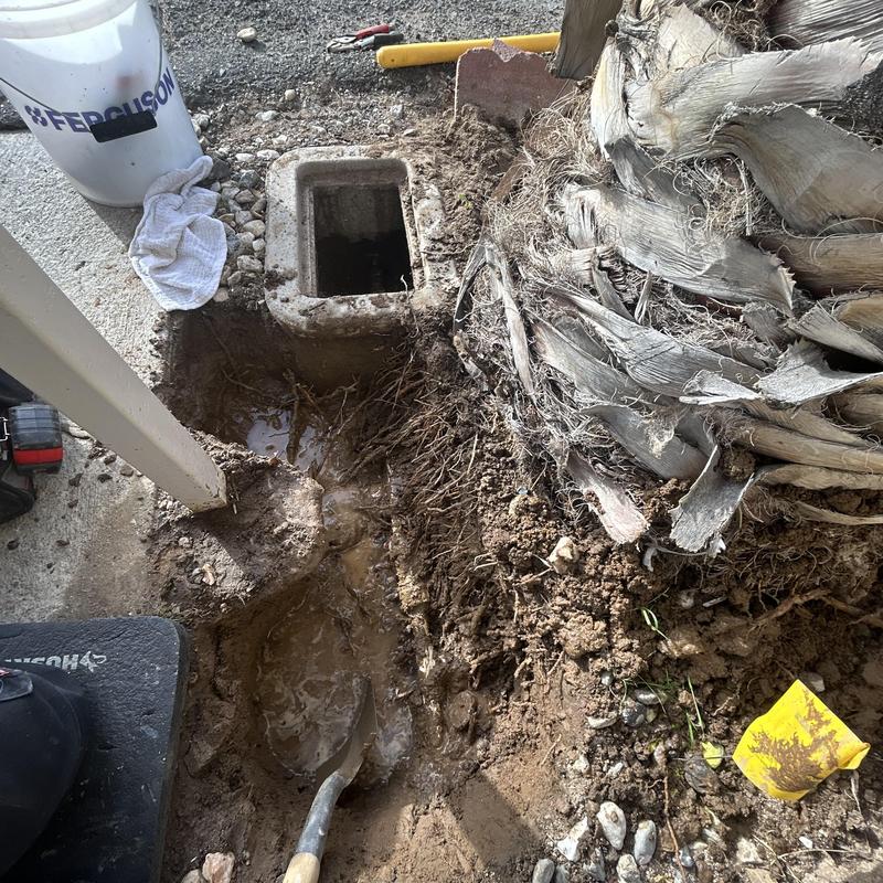 Underground water leak excavation near irrigation box