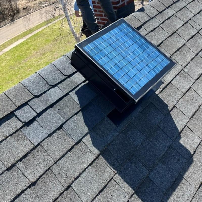 Solar-powered roof vent installation on asphalt shingles Solar-powered roof vent installation on asphalt shingles