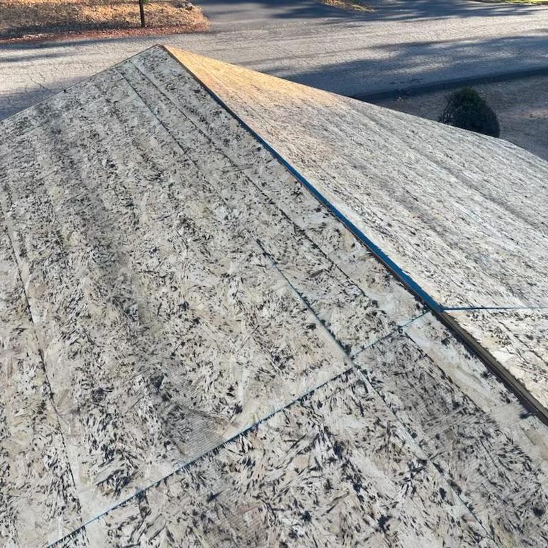 Roof sheathing installation on residential roof deck