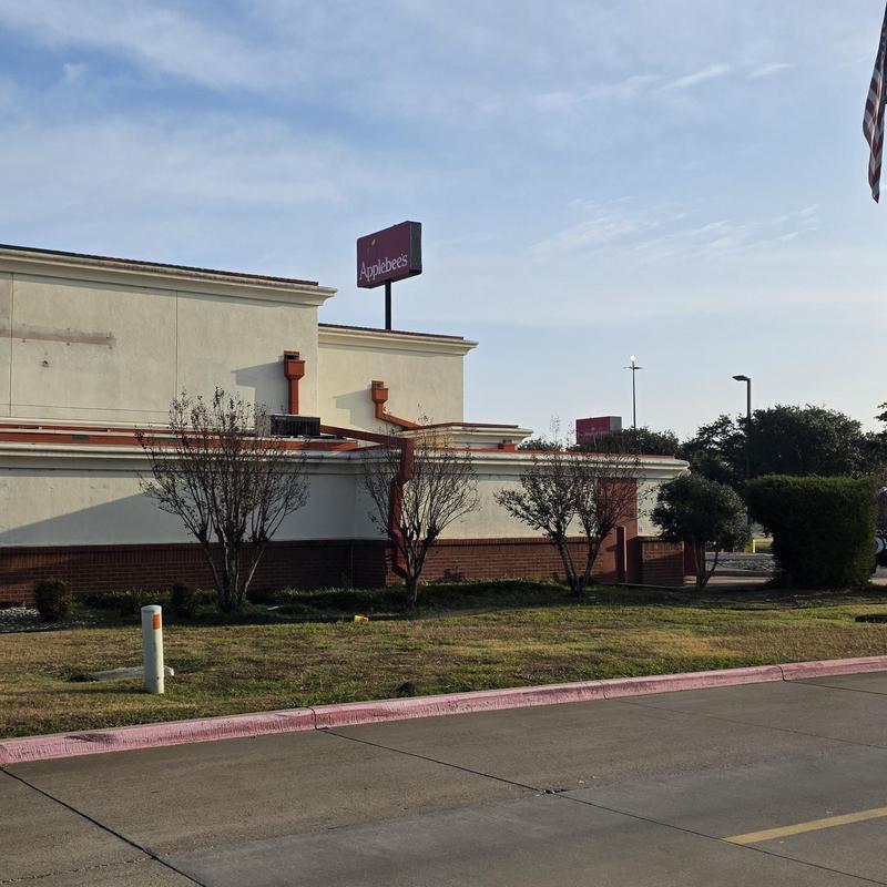 Restaurant roof exterior with trees and sidewalk Restaurant roof exterior with trees and sidewalk