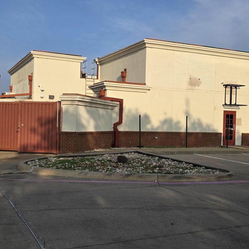 Exterior wall hail damage inspection on commercial building Exterior wall hail damage inspection on commercial building