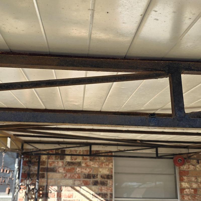 Metal patio roof frame with hail damage in Terrell, TX