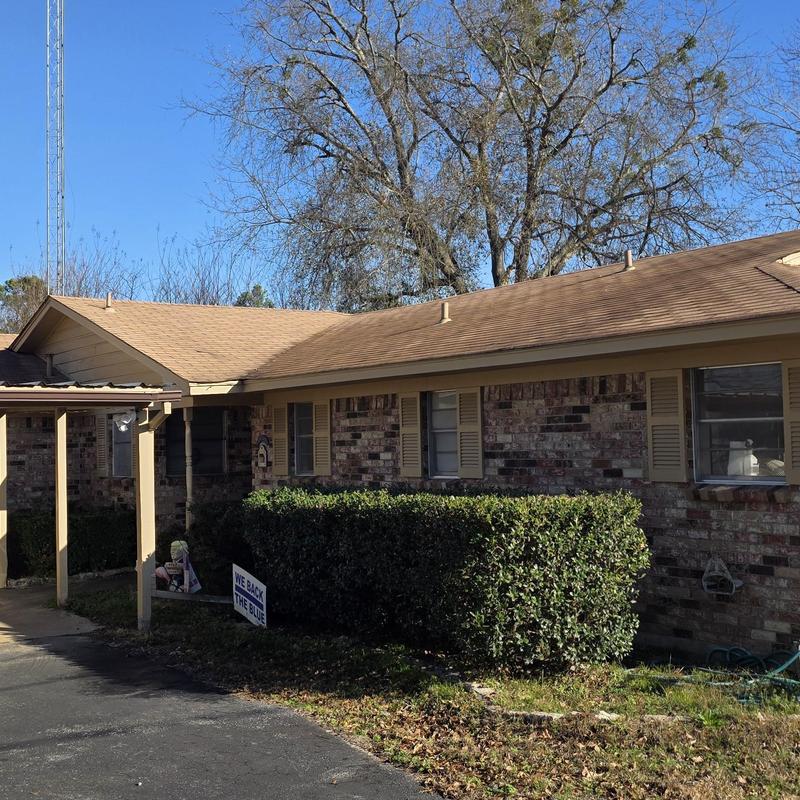 Asphalt shingle roof with wind damage in Terrell, TX