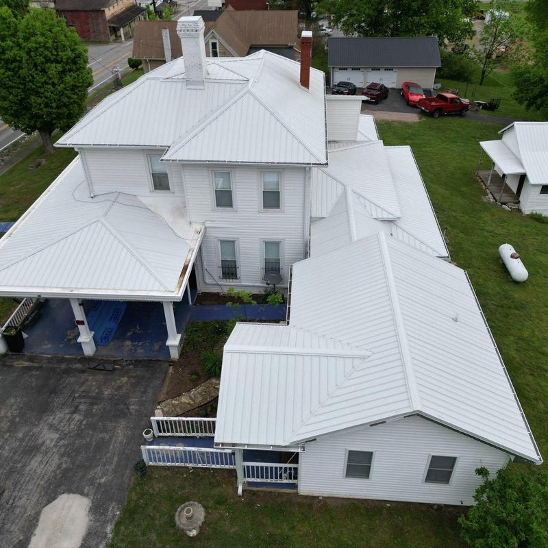 Metal roofing system inspection on multi-section home
