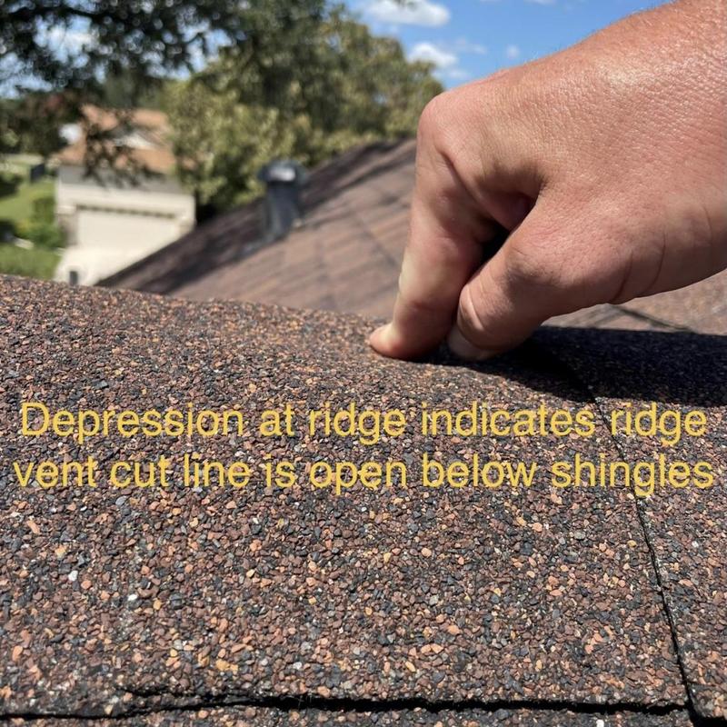 Ridge vent cut line open beneath asphalt shingles