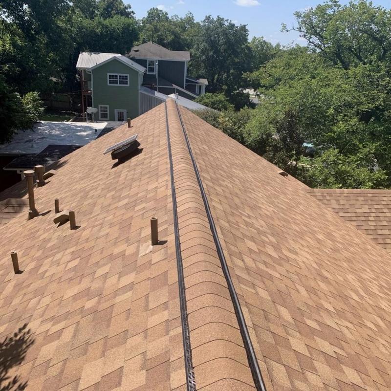 Owens Corning asphalt shingle roof with lead pipe boots