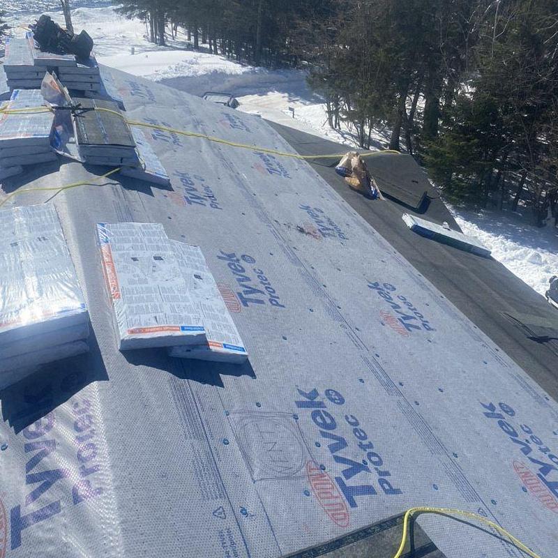 CertainTeed shingles and Tyvek underlayment on roof CertainTeed shingles and Tyvek underlayment on roof