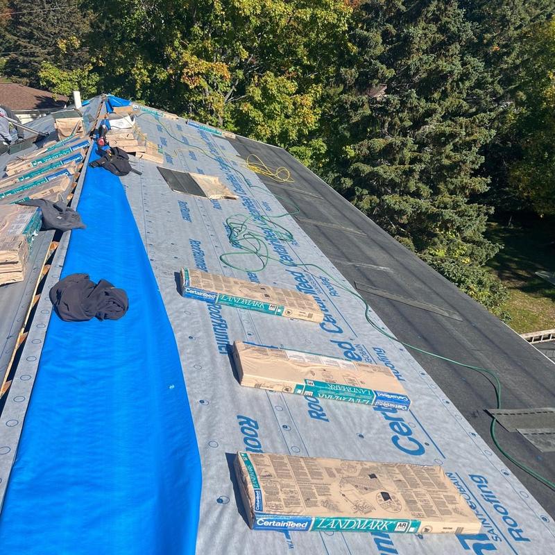 CertainTeed Landmark shingles and vapor barrier installation on roof CertainTeed Landmark shingles and vapor barrier installation on roof