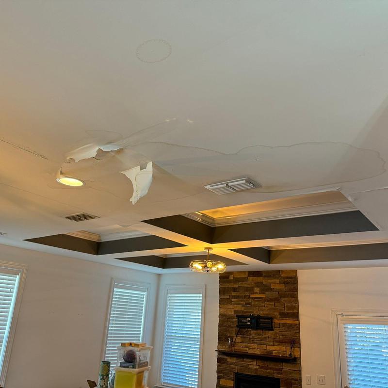 Ceiling drywall with water damage and peeling paint