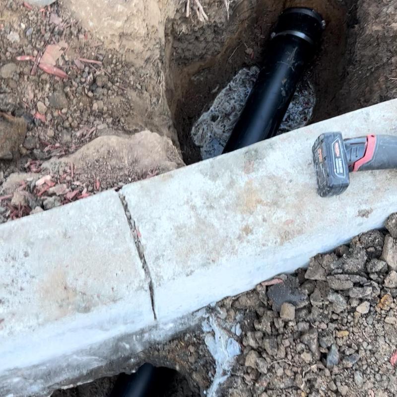 8-inch ABS drain pipe replacement in concrete trench