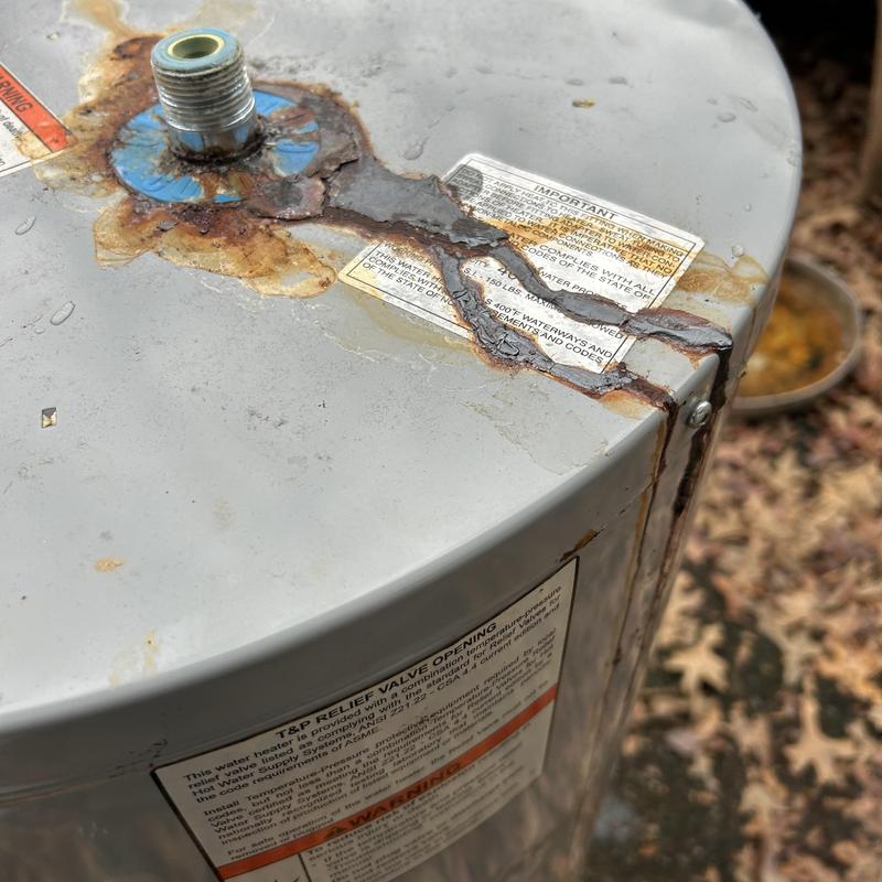 Water heater with severe rust and leaking corrosion