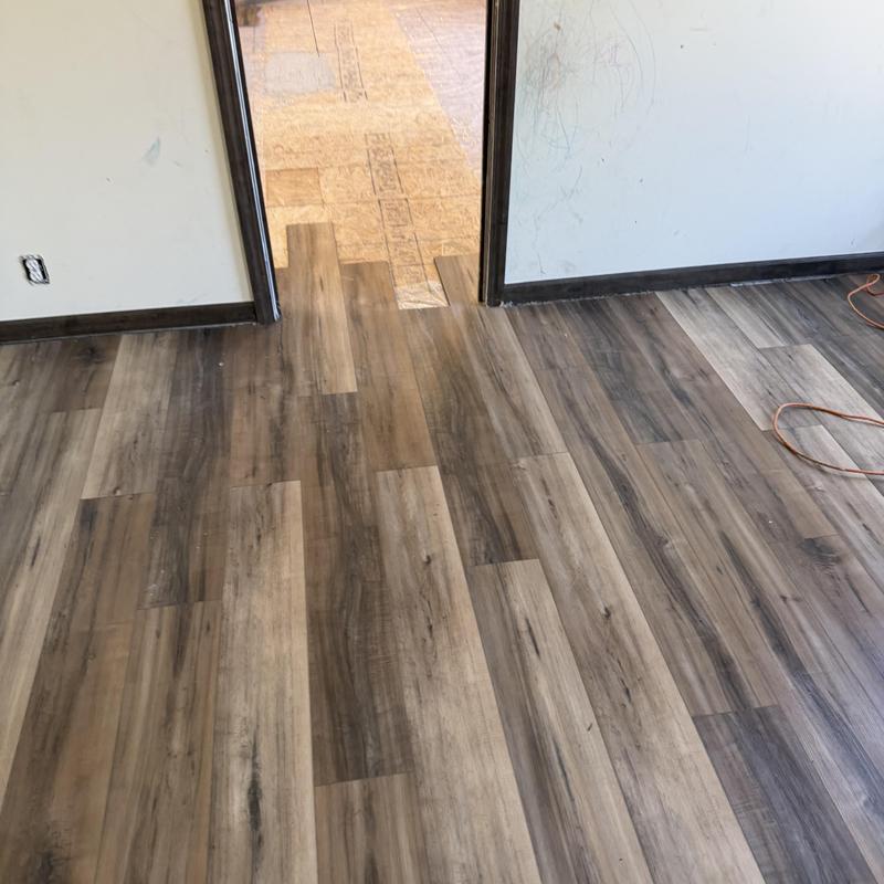 Vinyl plank flooring installation in room transition Vinyl plank flooring installation in room transition
