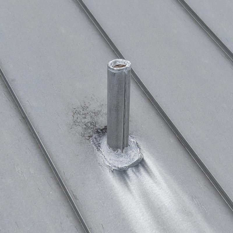 Plumbing vent pipe flashing with galvanic corrosion damage