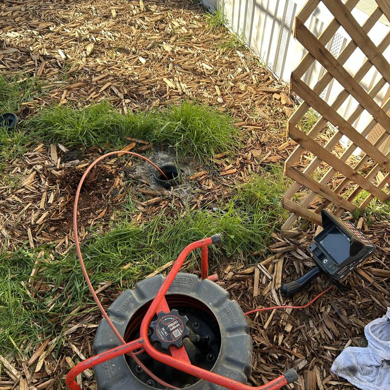 Sewer cable and camera inspection at main cleanout outdoors