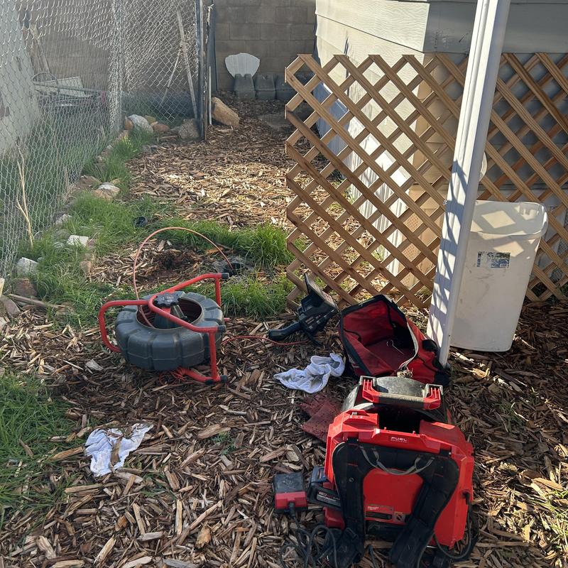 Sewer main cleanout with plumbing inspection tools