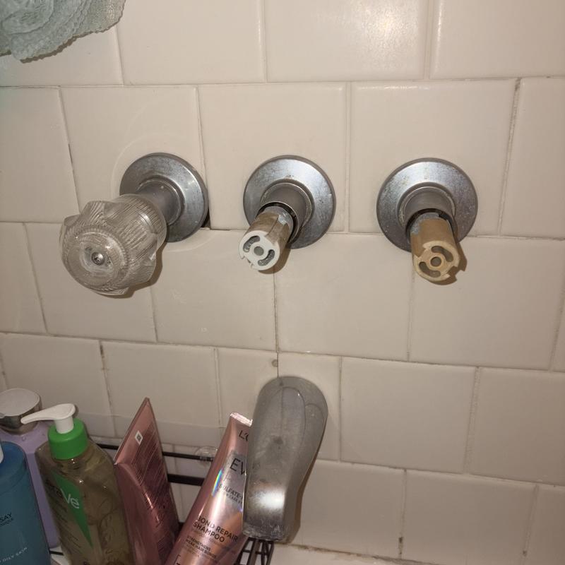 Three-handle shower valve cartridge replacement