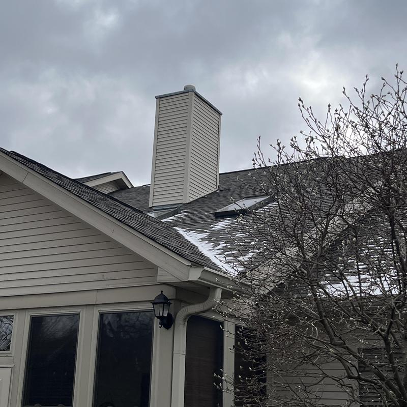 Skylight glass fielding on condo roof with drainpipe Skylight glass fielding on condo roof with drainpipe