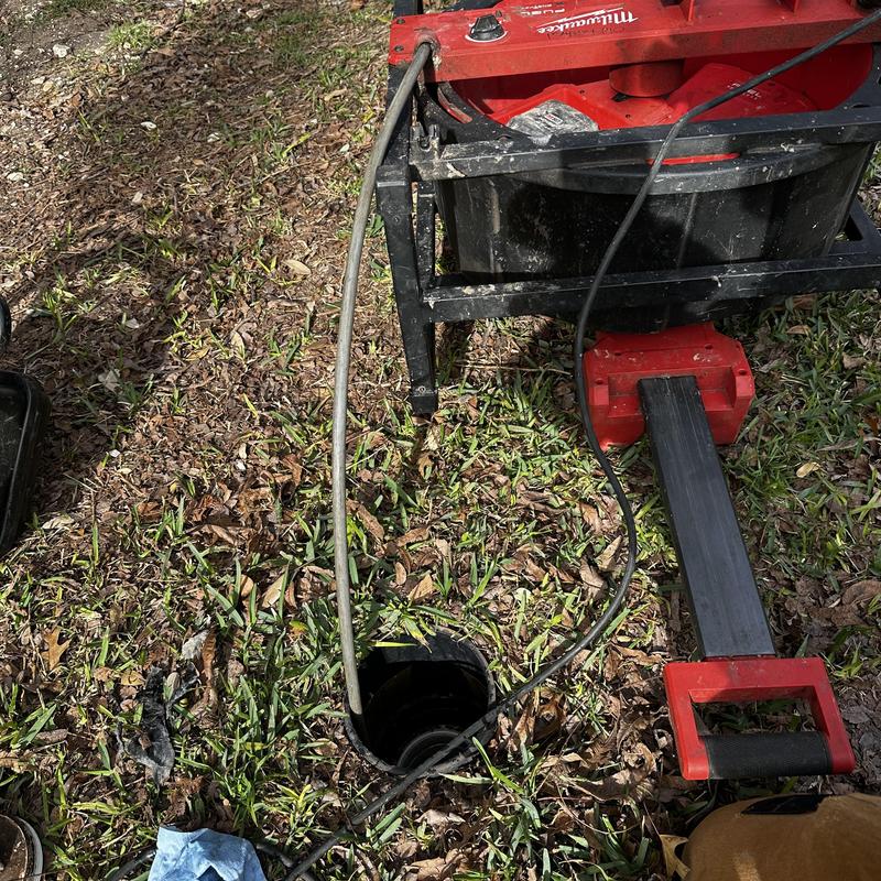 Main sewer line with inspection camera and cleaning tool