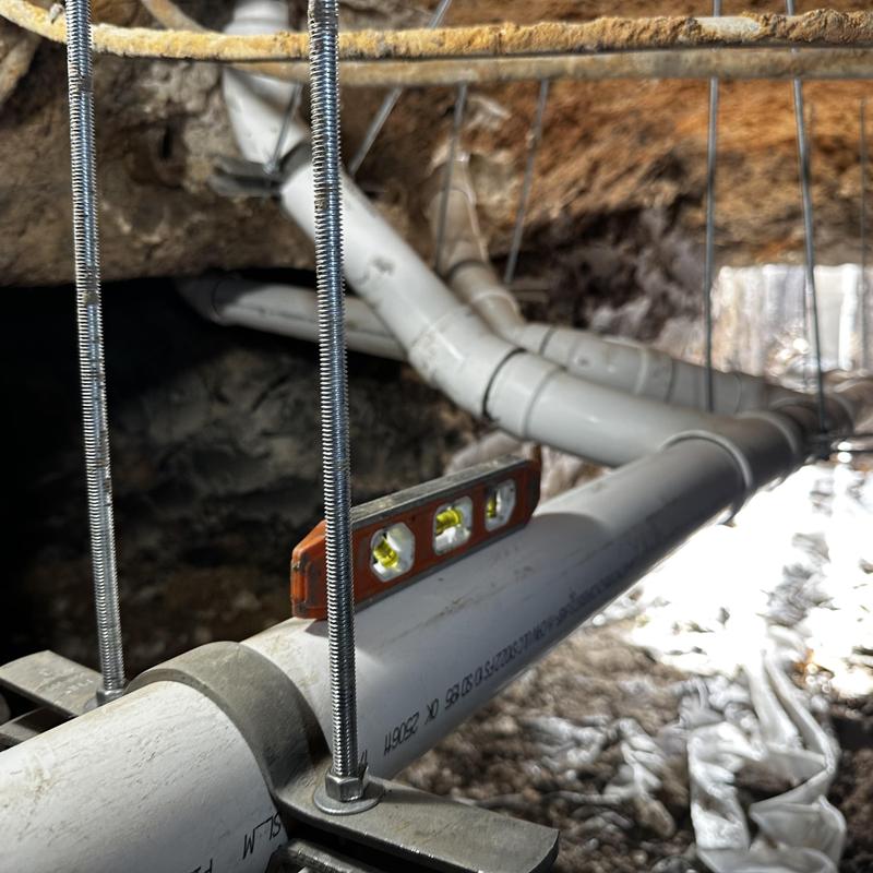 Schedule 40 PVC sewer drain lines installed underground