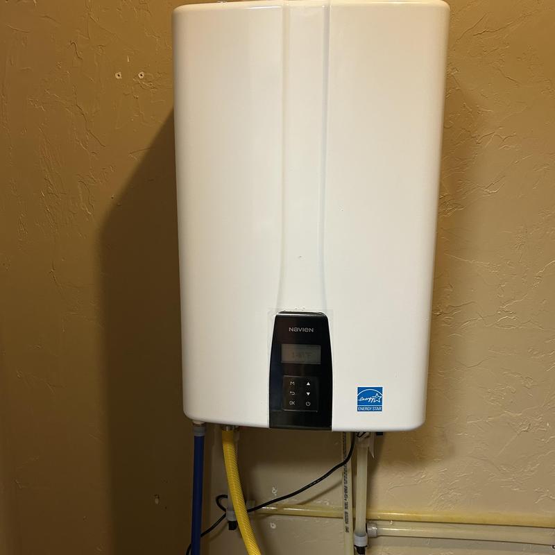 Tankless water heater installation with digital display