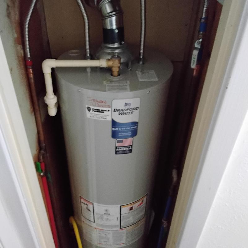 40 gallon gas water heater with vent and piping installation