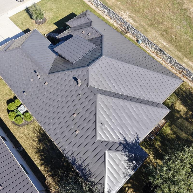 24 gauge standing seam metal roof with oil canning