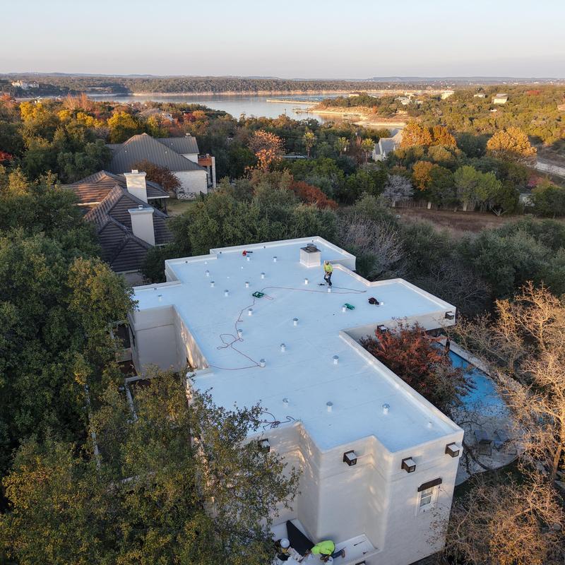 GAF EverGuard TPO roof installation on flat residential roof