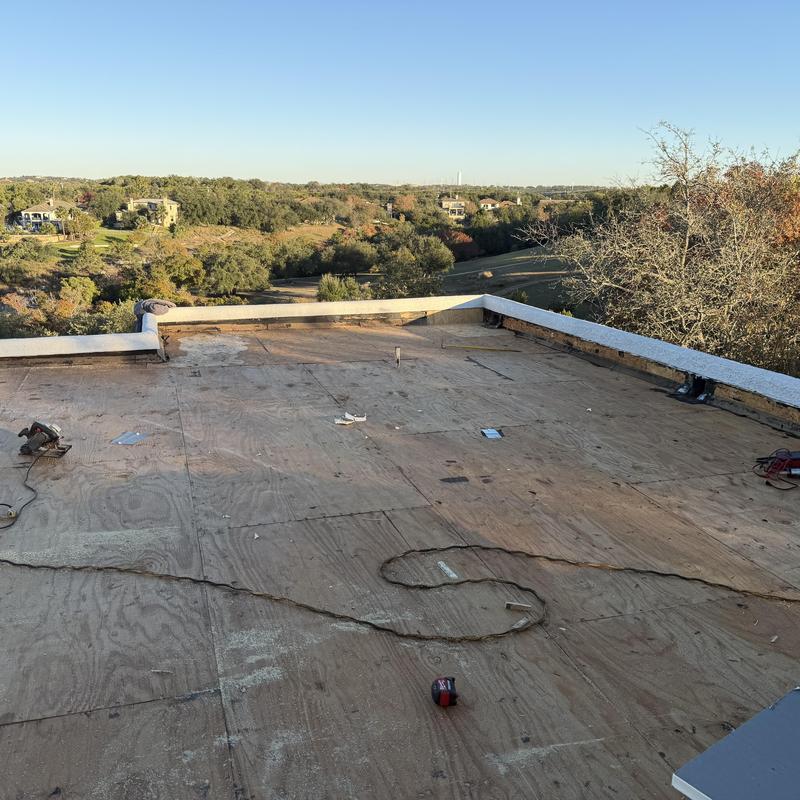 Plywood roof decking removal on flat roof in Lakeway TX