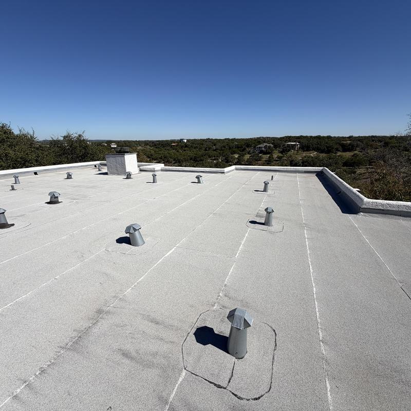 GAF EverGuard TPO flat roof with vent caps