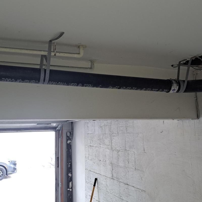 Main sewer horizontal drain pipe with new slope installed Main sewer horizontal drain pipe with new slope installed