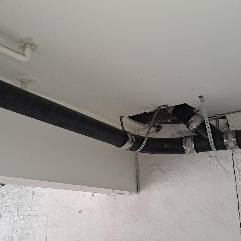 Main and secondary sewer horizontal drain pipes with clamps Main and secondary sewer horizontal drain pipes with clamps