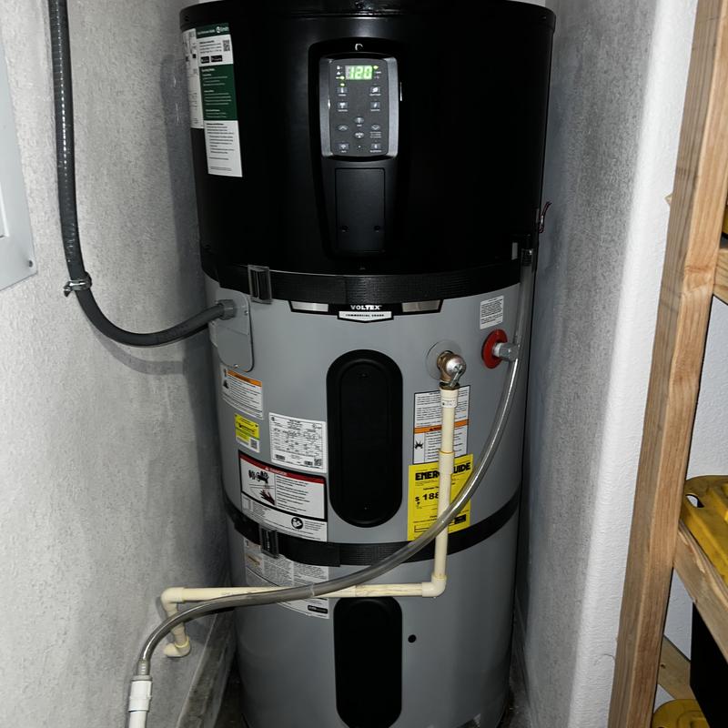 Electric water heater with digital control panel installed