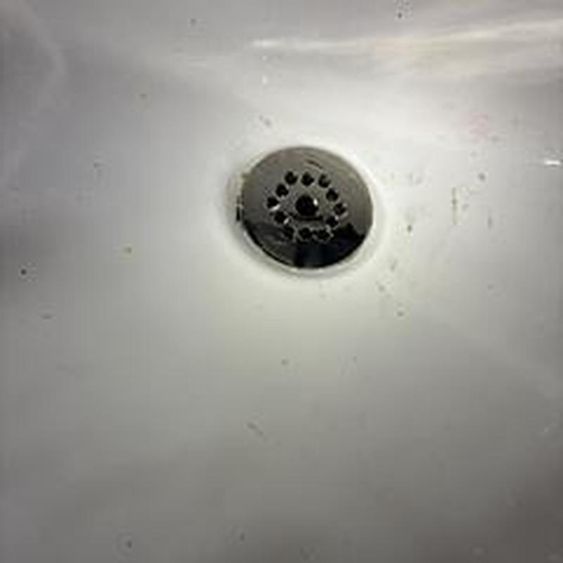 Lavatory sink drain with metal drain cover