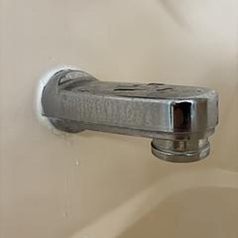 Diverter spout installation on bathroom tub wall