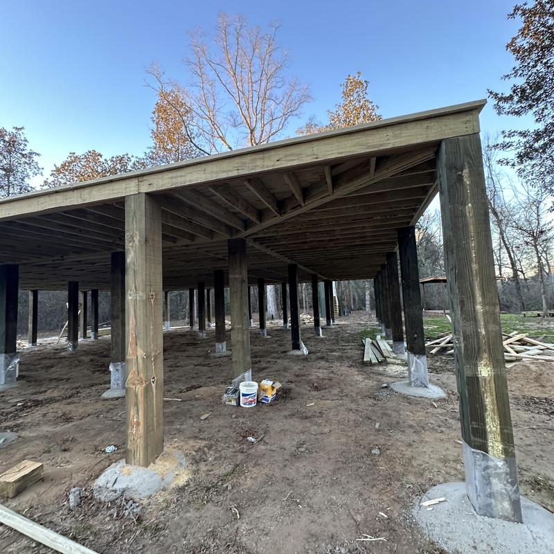 Foundation pier supports elevated 10 feet above ground Foundation pier supports elevated 10 feet above ground