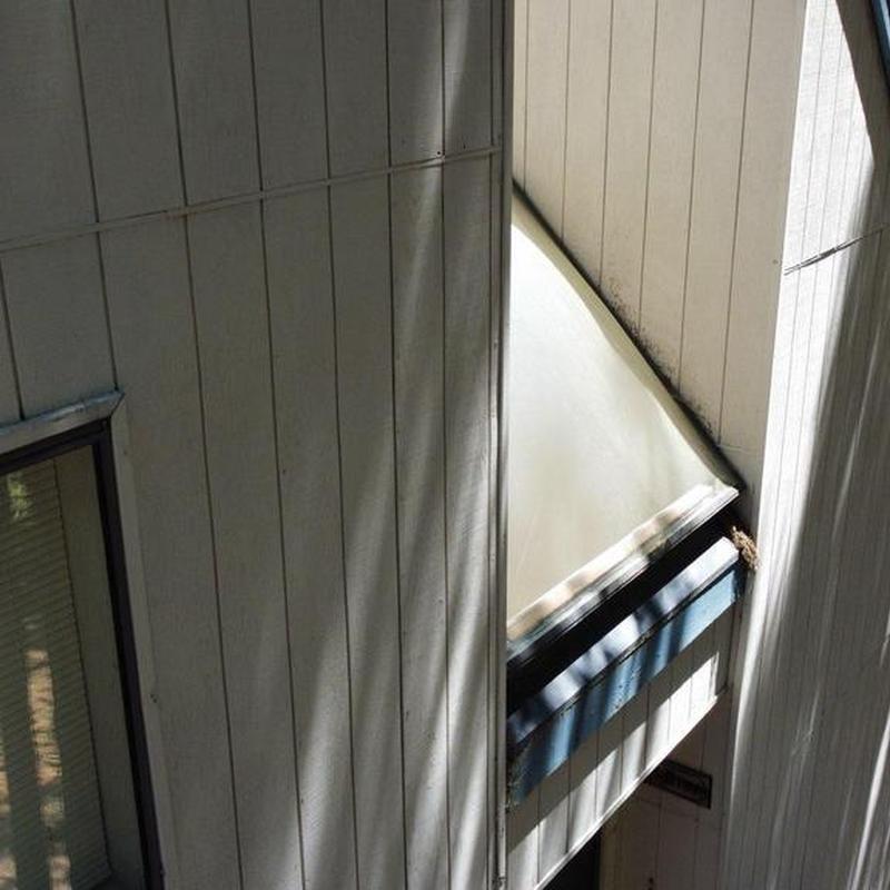 Storm-damaged skylight removed from exterior wall opening