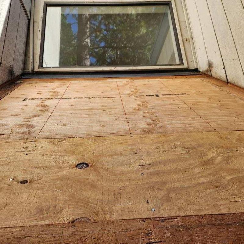 Skylight removal with plywood framing and new roofing