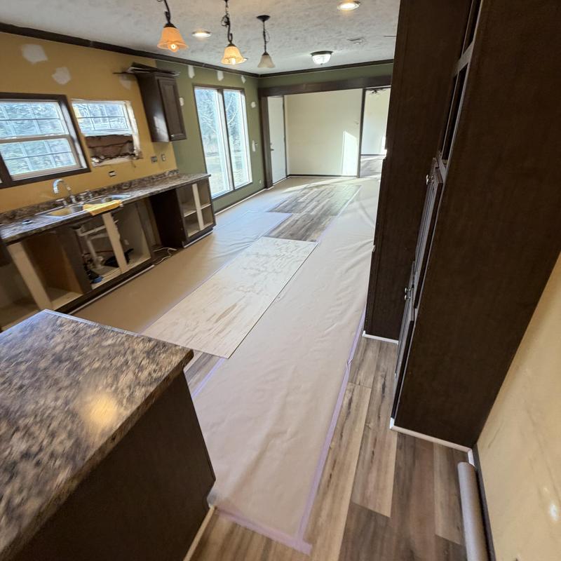 Vinyl plank flooring installation and prep in kitchen Vinyl plank flooring installation and prep in kitchen