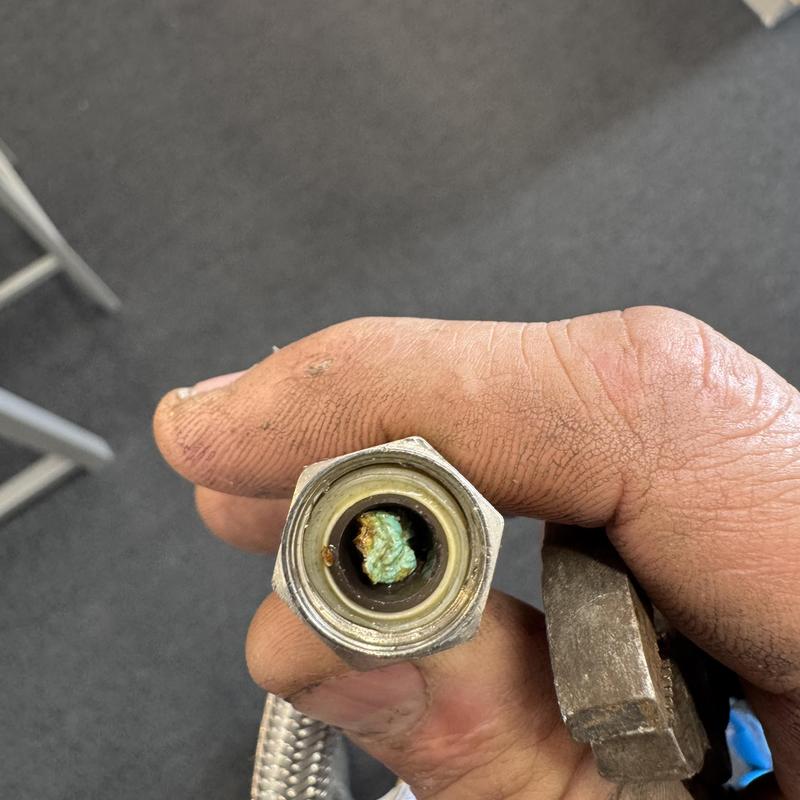 Toilet line angle stop with corrosion buildup