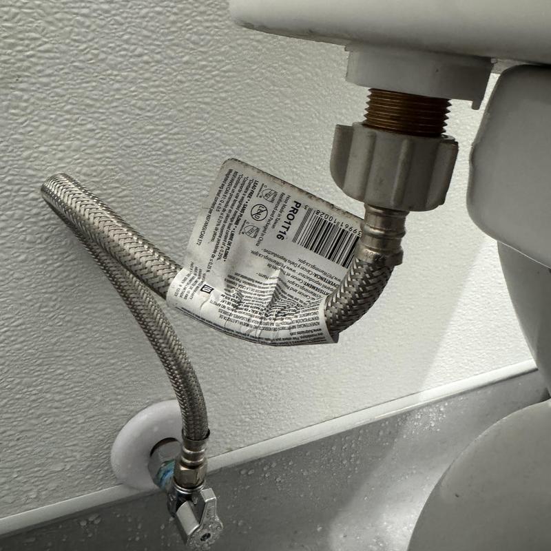 Toilet angle stop valve with braided supply line