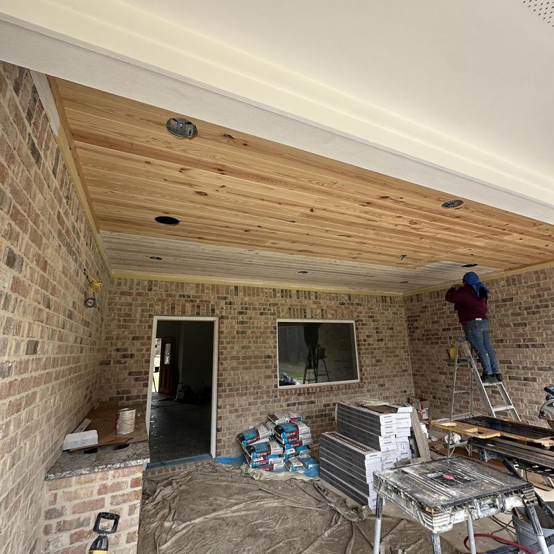 Wood ceiling installation and finishing on porch Wood ceiling installation and finishing on porch