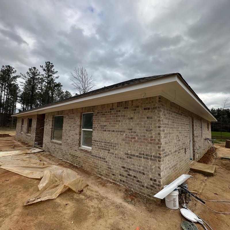 Brick exterior prep and painting on new construction house Brick exterior prep and painting on new construction house