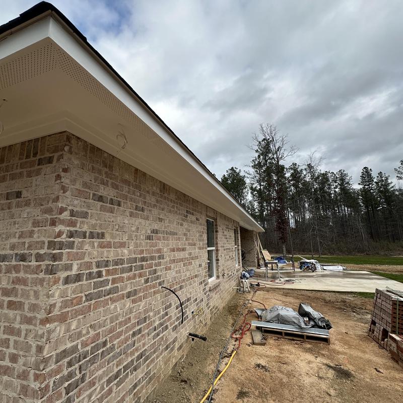 Brick exterior wall with soffit installation and prep Brick exterior wall with soffit installation and prep