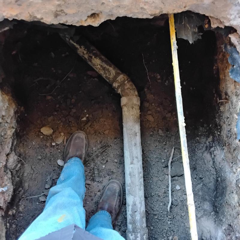3-inch PVC sewer line in garage excavation