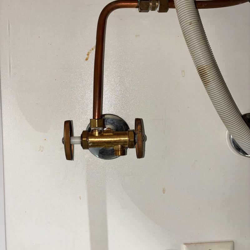 Dual angle stop valve and copper piping under sink
