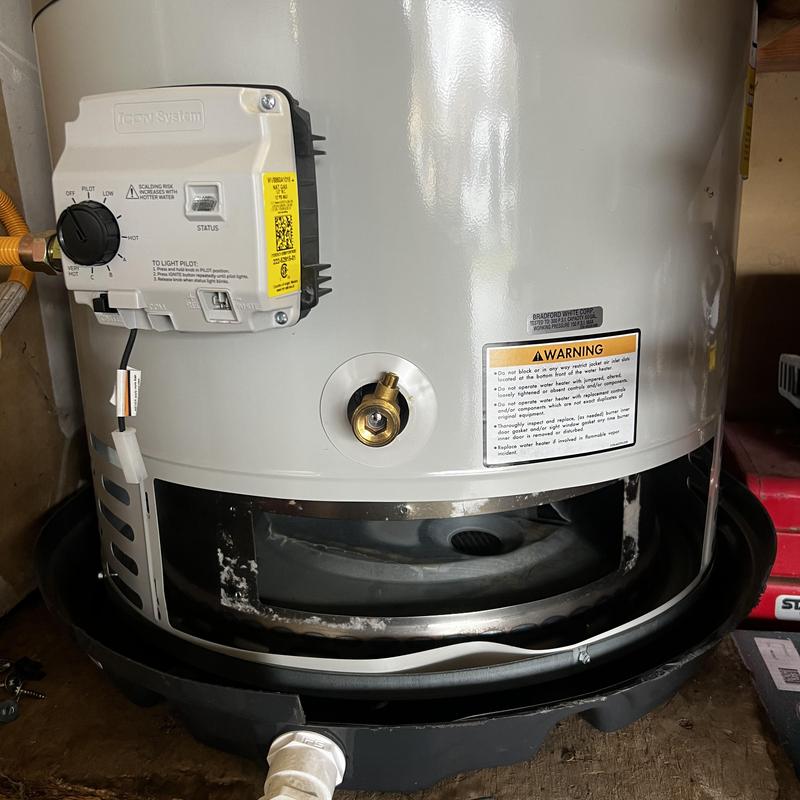 Water heater burner and pilot assembly installation