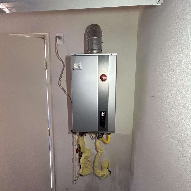 Rheem tankless water heater with new venting and gas line