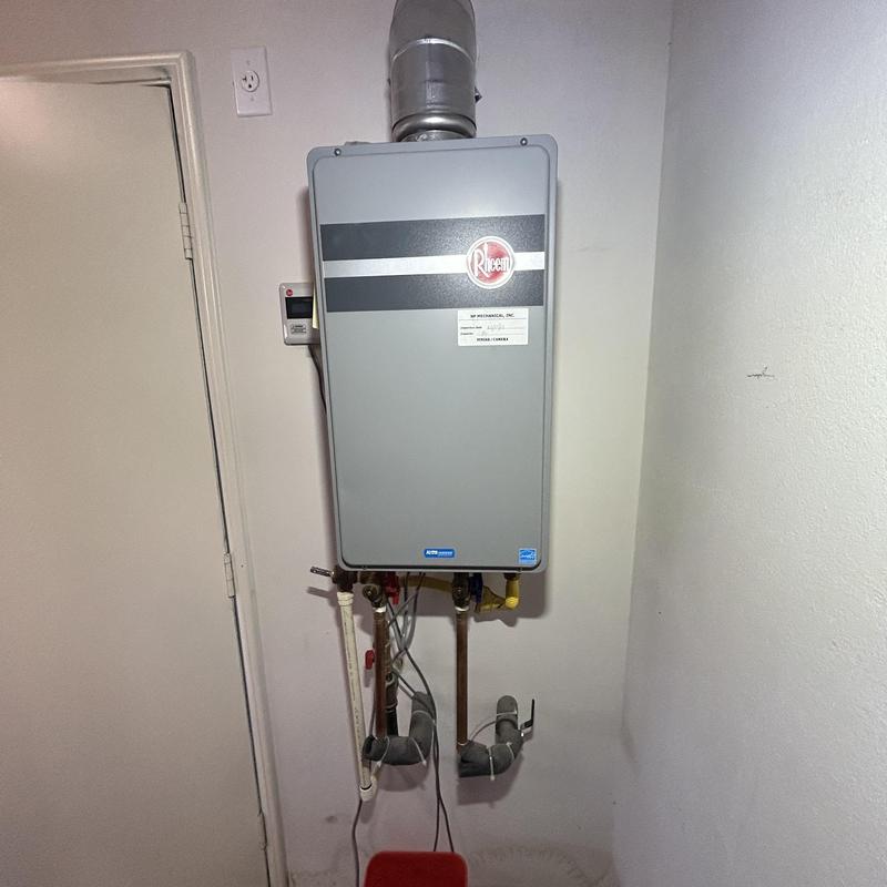 Rheem tankless water heater with vent and piping
